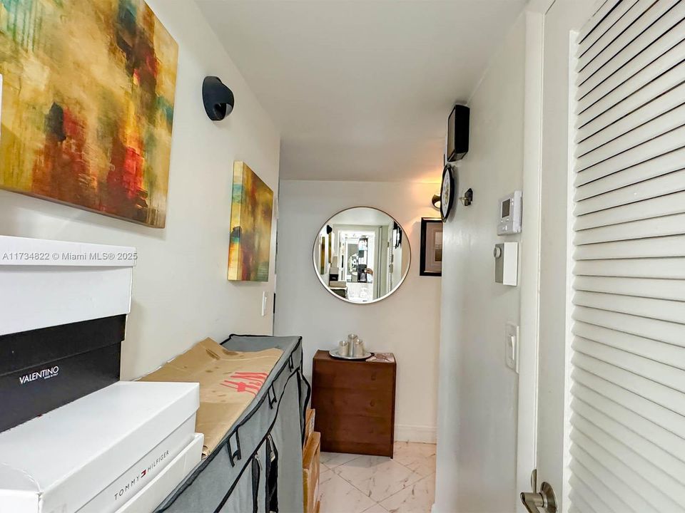 Hall between Bathroom and Entrances