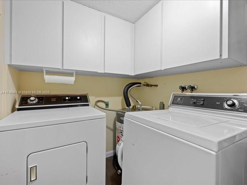 Inside large laundry room , New H20 tank