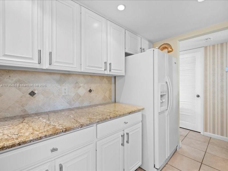 Granite countertops, plenty of cabinets