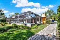 View of the enclosed pool from the yard