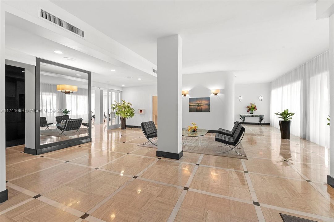 Marble floors and high ceilings great you at the lobby of the elegant Monterey, the Grande Dame of Bay Harbor Islands