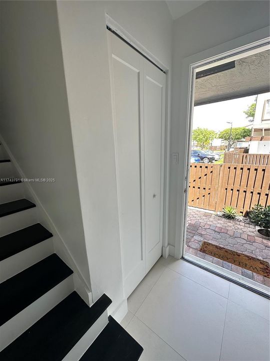 entry closet and stairs