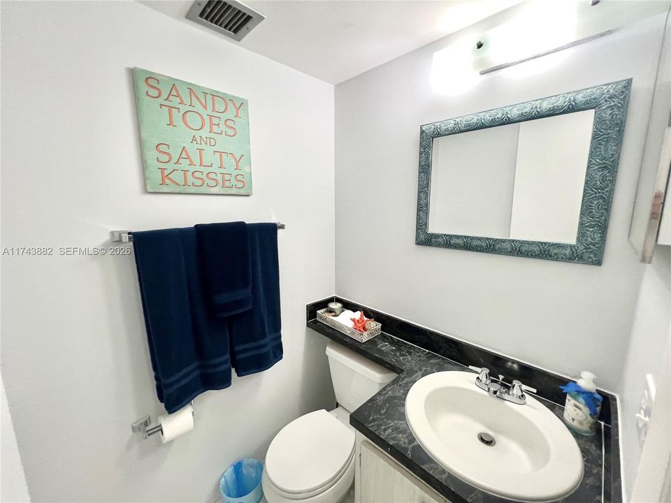 Hall Half Bath off Livingroom for Guests