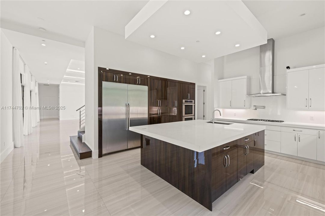 walking back towards the kitchen to the main home.