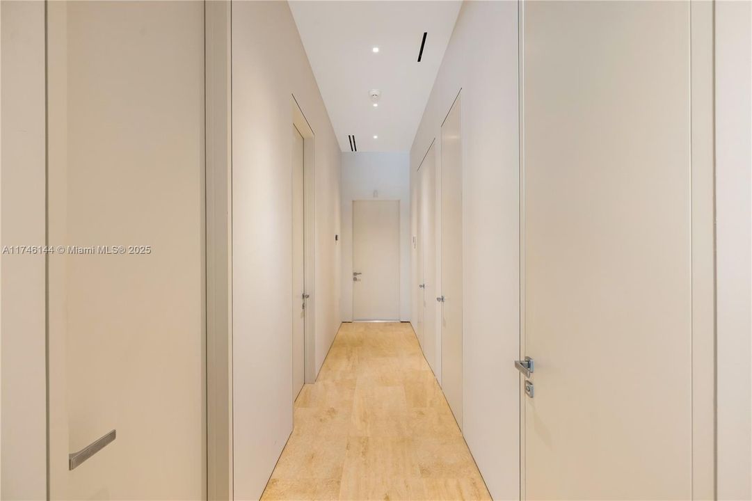 walkway to garage, maids quarters, storage rooms