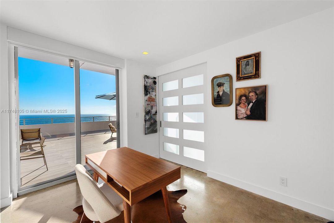 Bedroom with Cleo Wall Bed & access to Terrace & Custom Sliding Door to Living Room