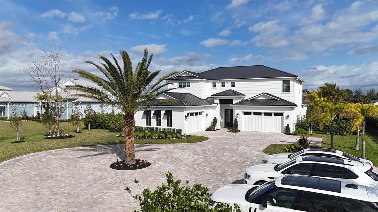 Expanded motor court with additional parking for guests