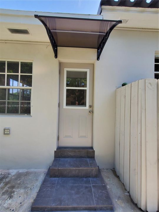 Efficiency Backside Private Entrance.