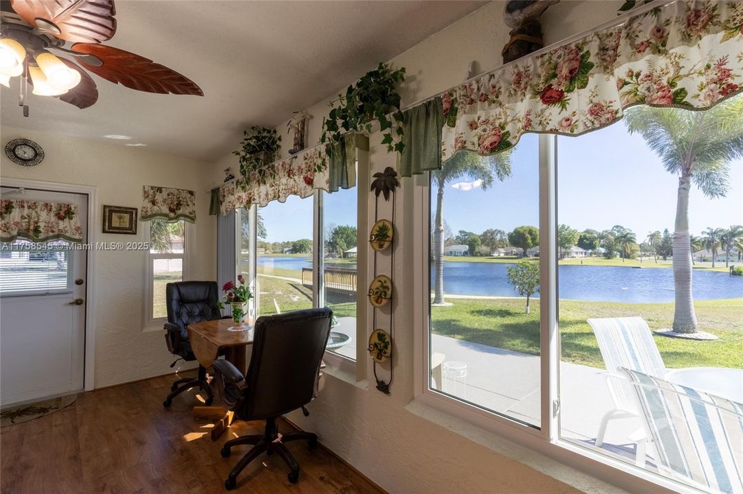 Florida room has spectacular views of the pond
