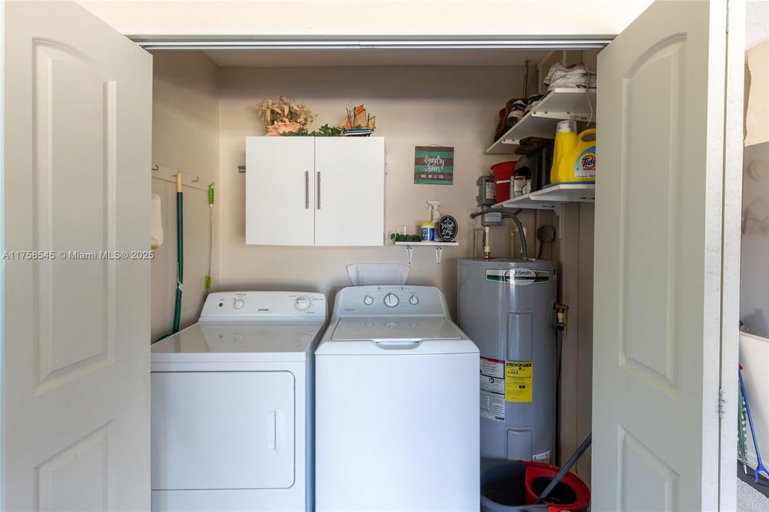 Laundry room in garage