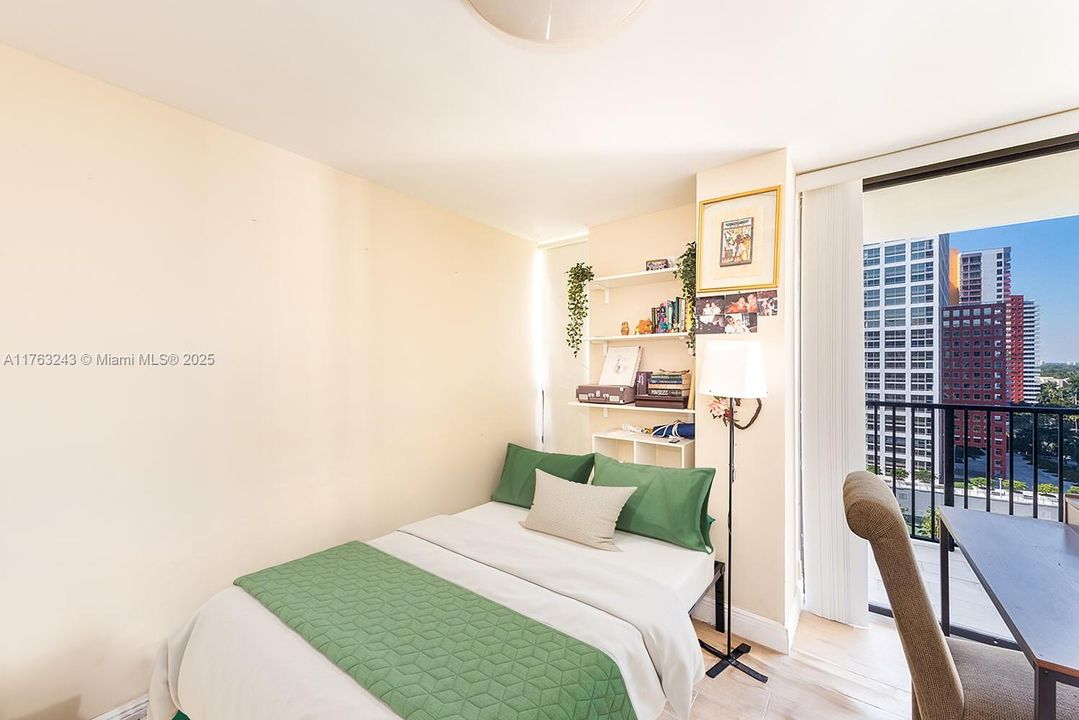 Virtually staged.  2nd bedroom.