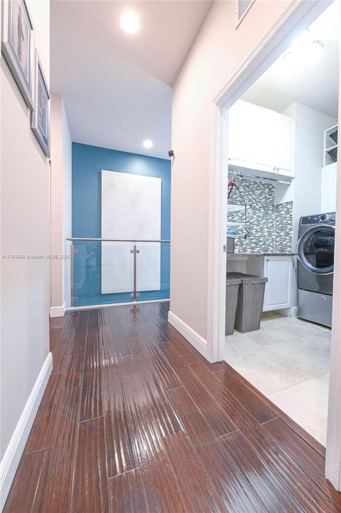 upper floor hallway, entry to laundry room