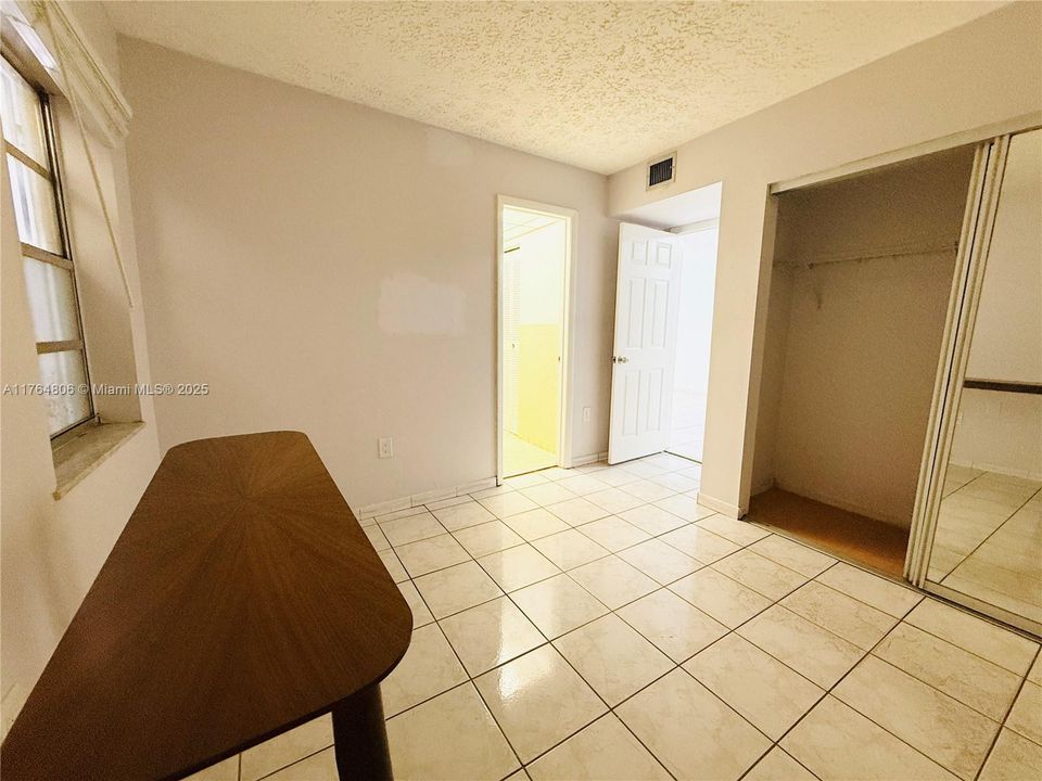 Bedroom with Reach-In Closet