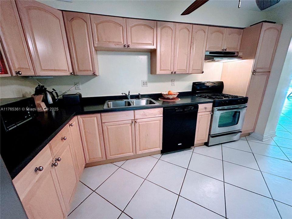 KITCHEN (EASY TO CLEAN DURABLE PORCELINE FLOORS).