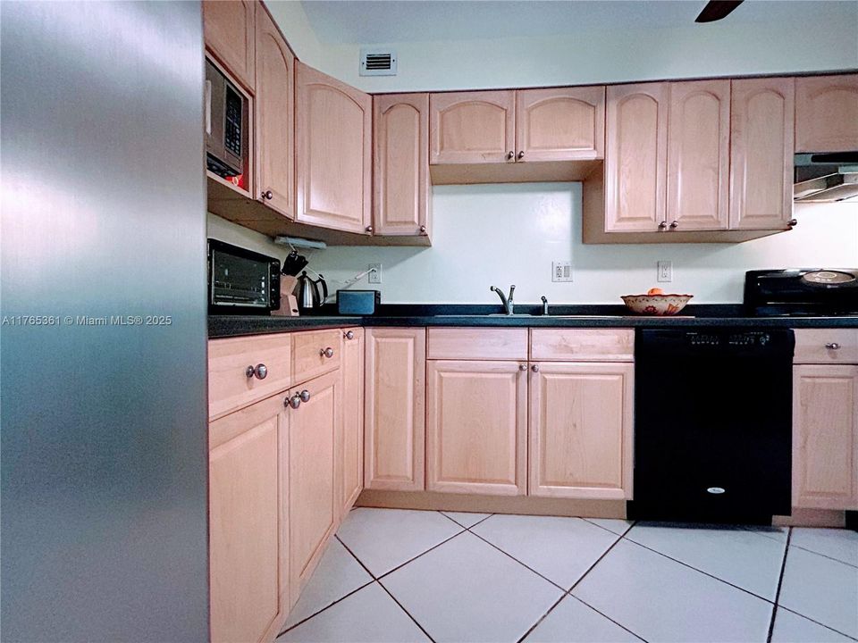 KITCHEN (STAINLESS STEEL REFRIGERATOR).