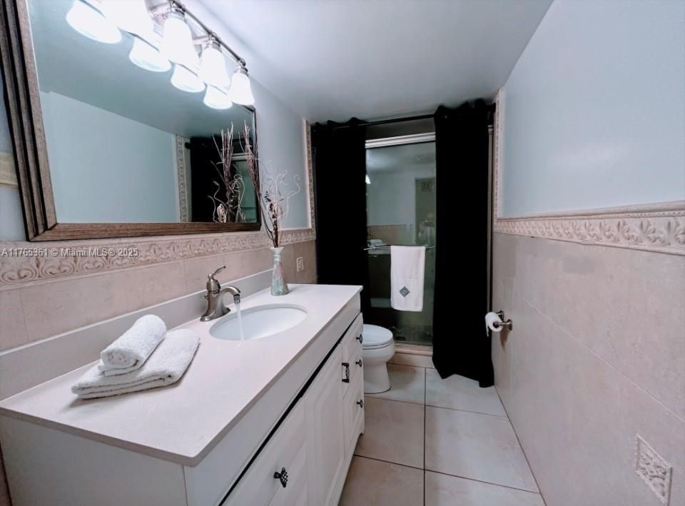 FAMILY BATHROOM WITH WALK IN SHOWER ENCLOSURE