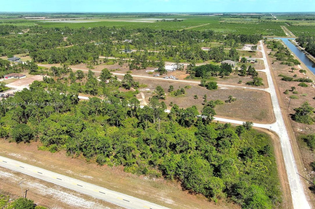 Active With Contract: $19,000 (0.23 acres)