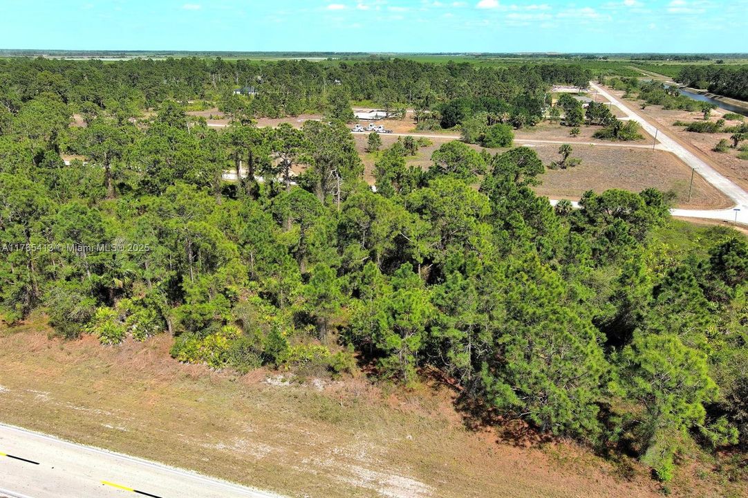 Active With Contract: $19,000 (0.23 acres)