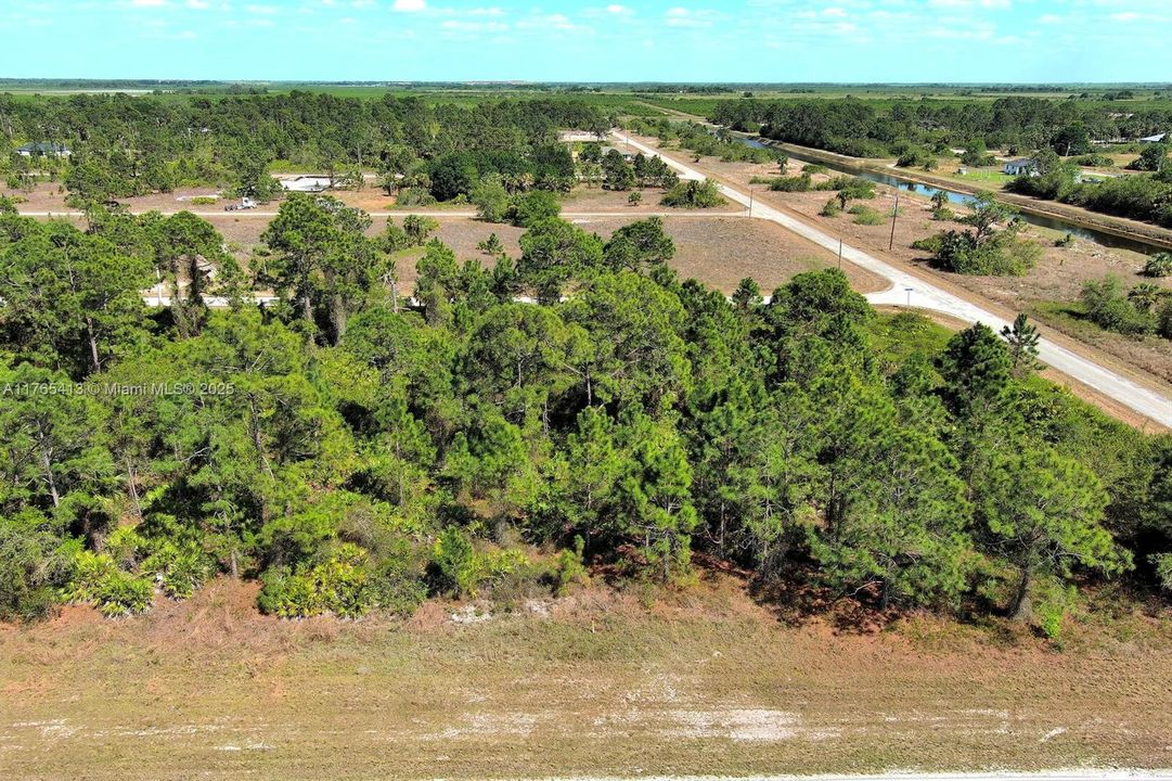 Active With Contract: $19,000 (0.23 acres)