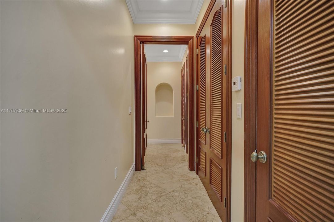 Hallway to bedrooms off Family room