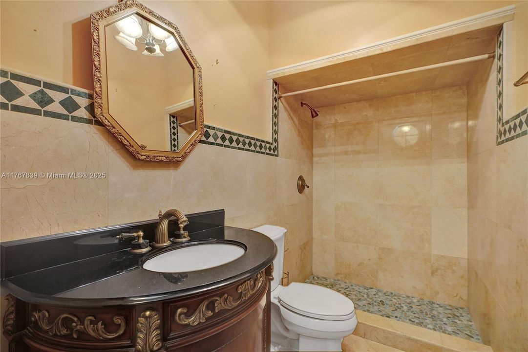 Bathroom by entry/garage