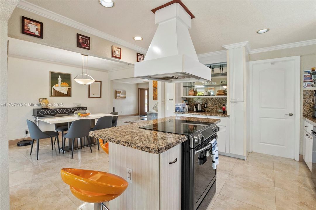 Cooking island with cook top