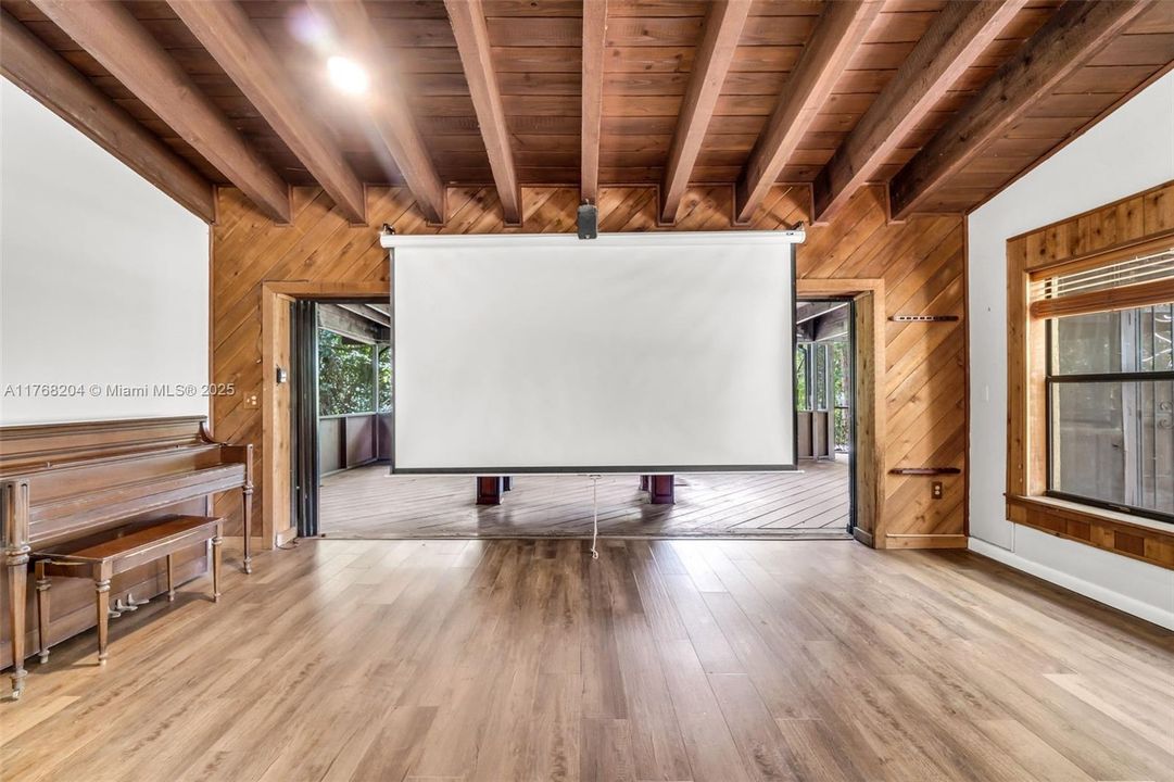 RETRACTABLE SCREEN PERFECT FOR FAMILY NIGHT MOVIES OR GAME NIGHT!