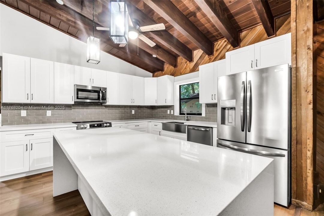 BRAND NEW CHEF'S KITCHEN WITH QUARTZ COUNTER AND BACKSPLASH