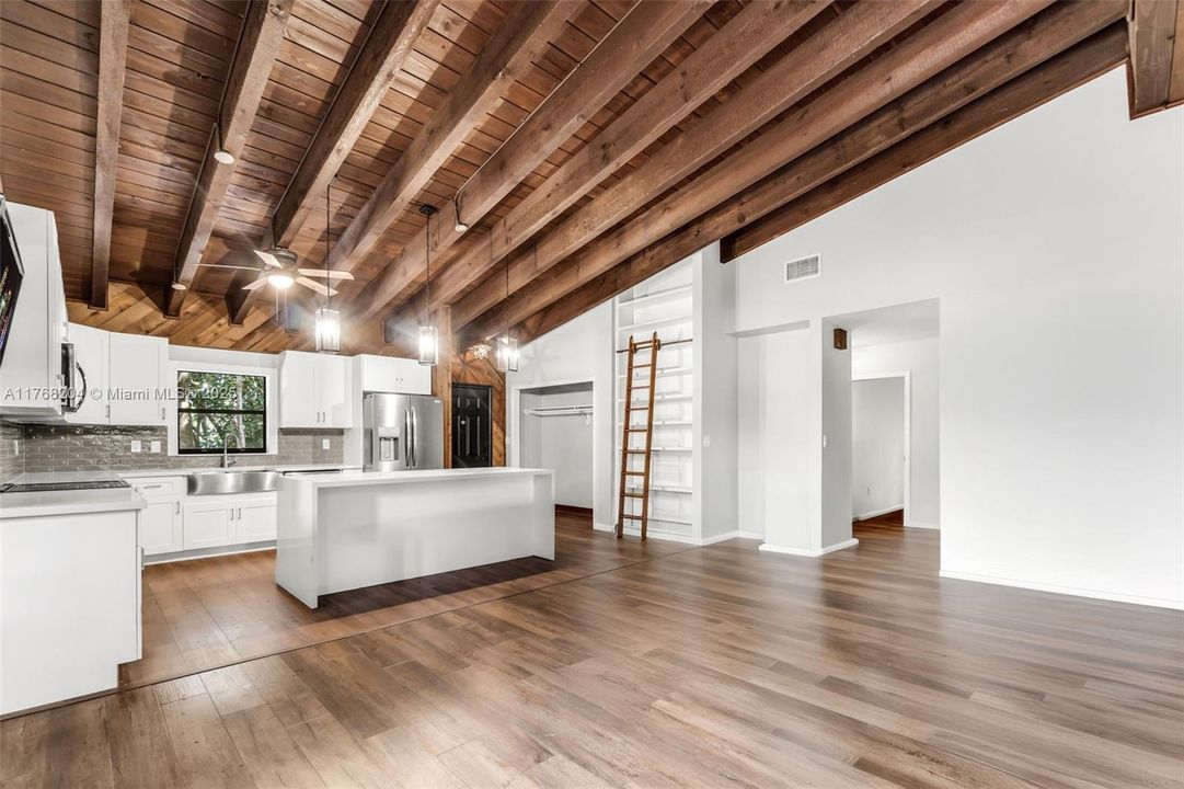 FROM GREAT ROOM BRAND NEW CHEF'S KITCHEN WITH WATERFALL ISLAND