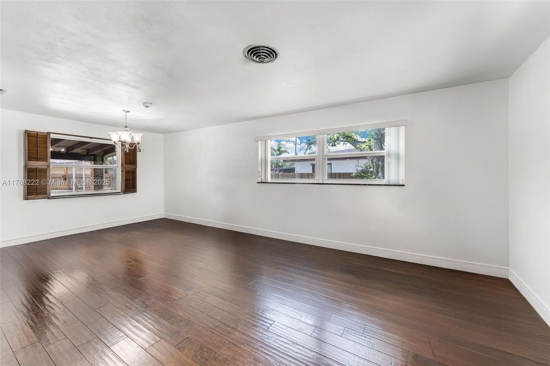 GREAT ROOM HAS REAL WOOD FLOORS!