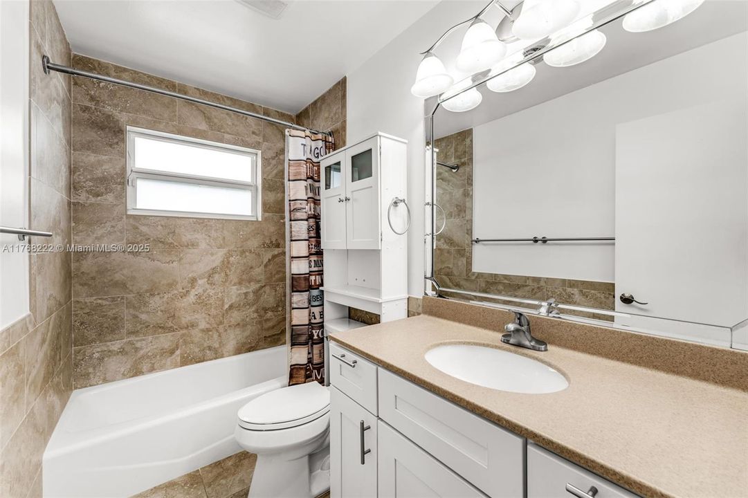 SECOND BATHROOM WITH TUB/SHOWER