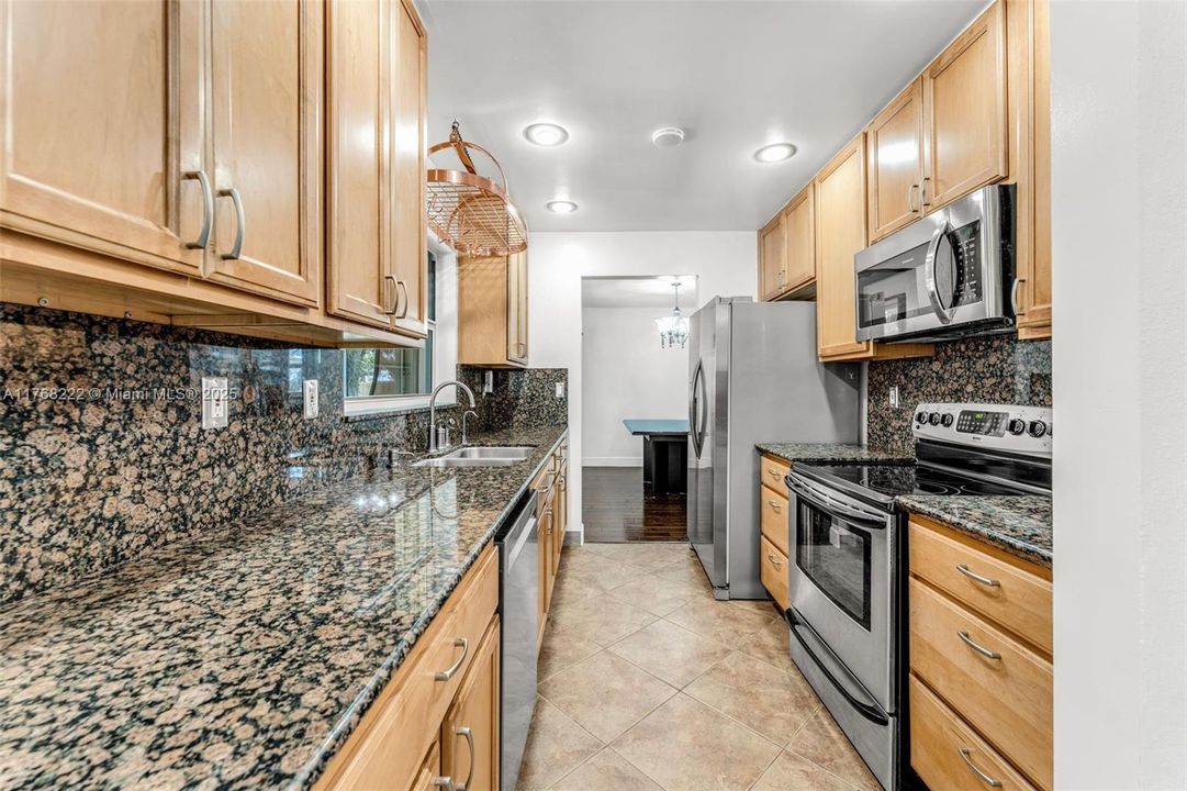 UPDATED KITCHEN WOOD CABINETS