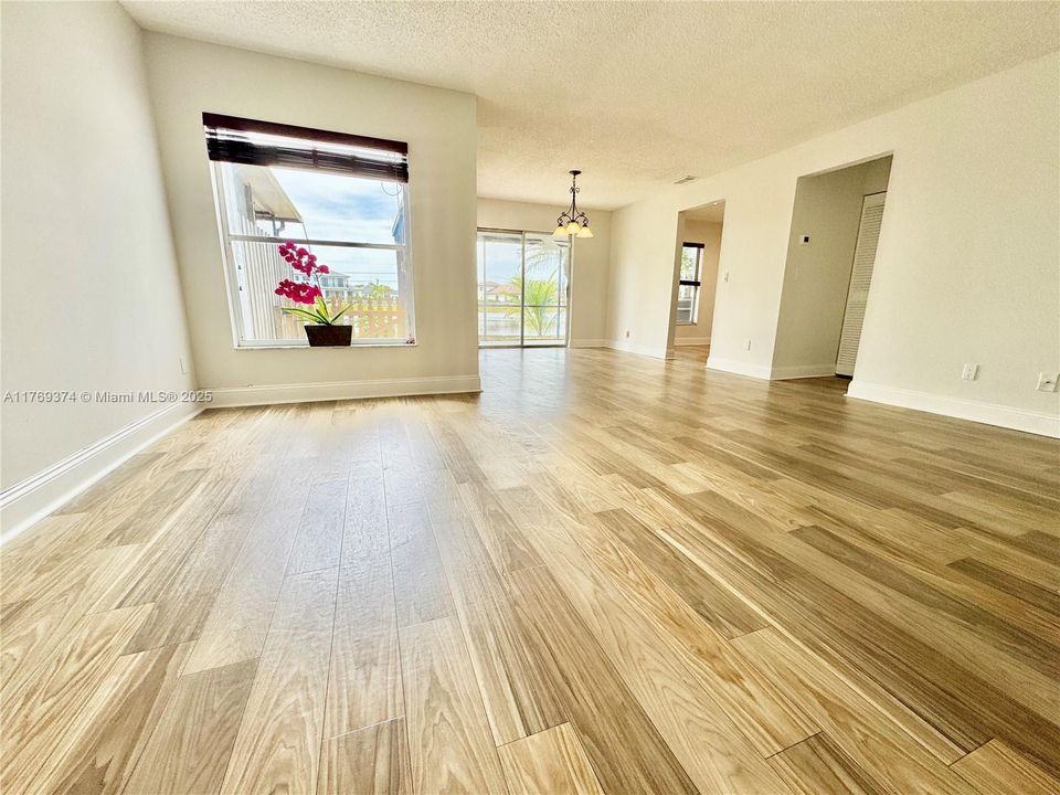 Spacious living room with lake view.