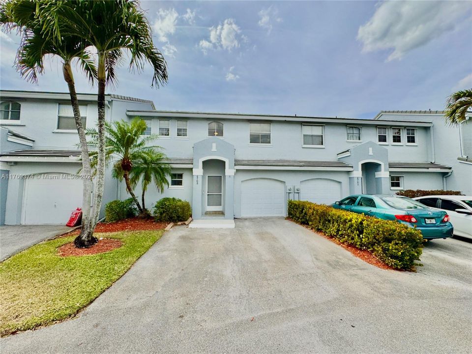 Townhome allows for 3 cars with a garage and 2 parking spaces out front.  Guest parking also available.