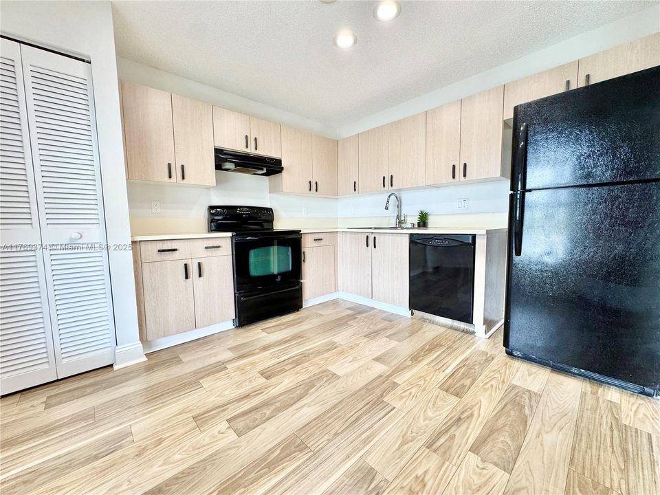 Kitchen boasts a pantry with lot's of storage space.