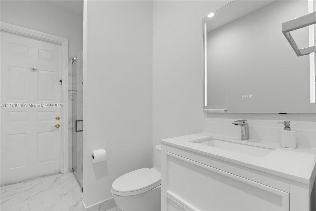 Lighted mirror & standing shower