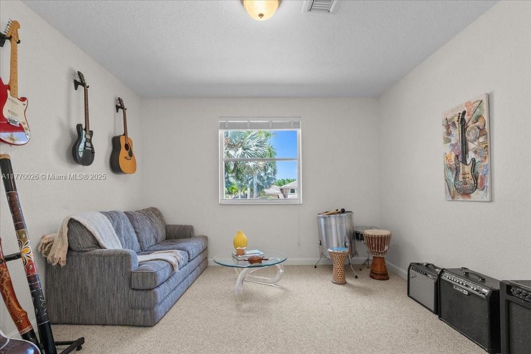 Bedroom 4 currently set up as a music room