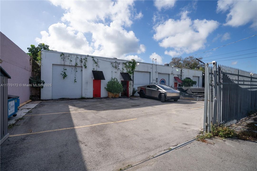 Facing the main campus of Magic City's development, Bay 4 is the most east bay in a 4-bay warehouse.  18' ceilings once inside the bay grade-level roll up door.  Inside the pedestrian door is a small 100 SF +/- office & restroom.