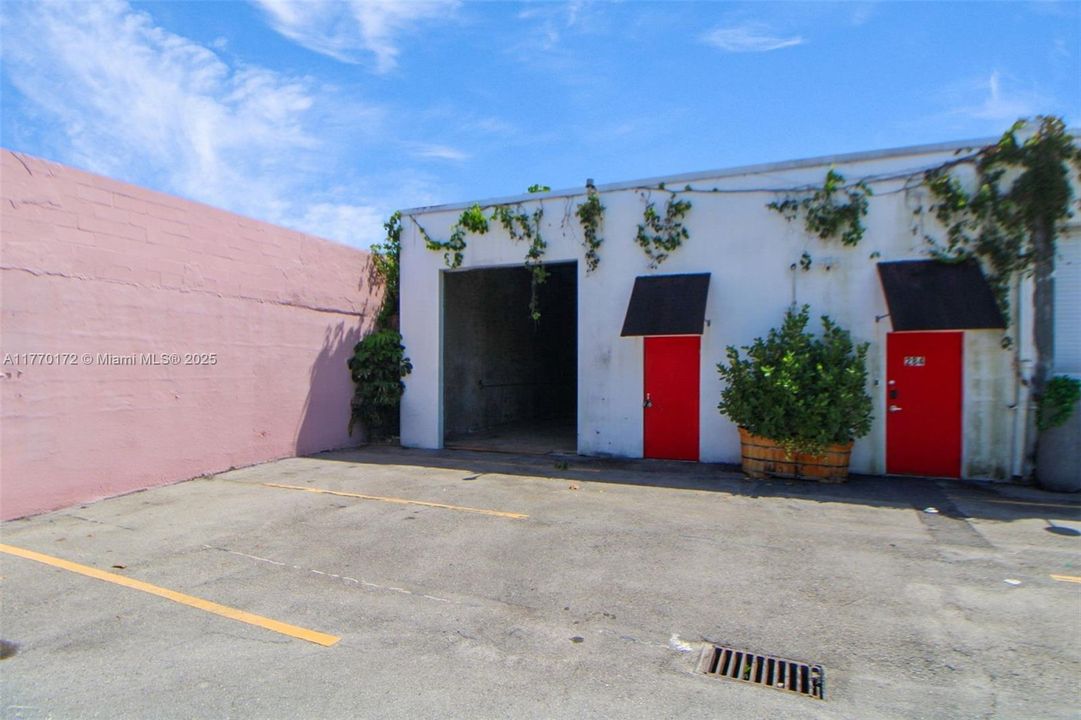 Two parking, roll up and pedestrian doors.