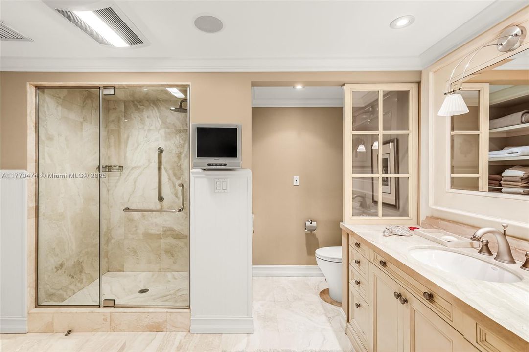 Primary bathroom w/ separate bath and shower