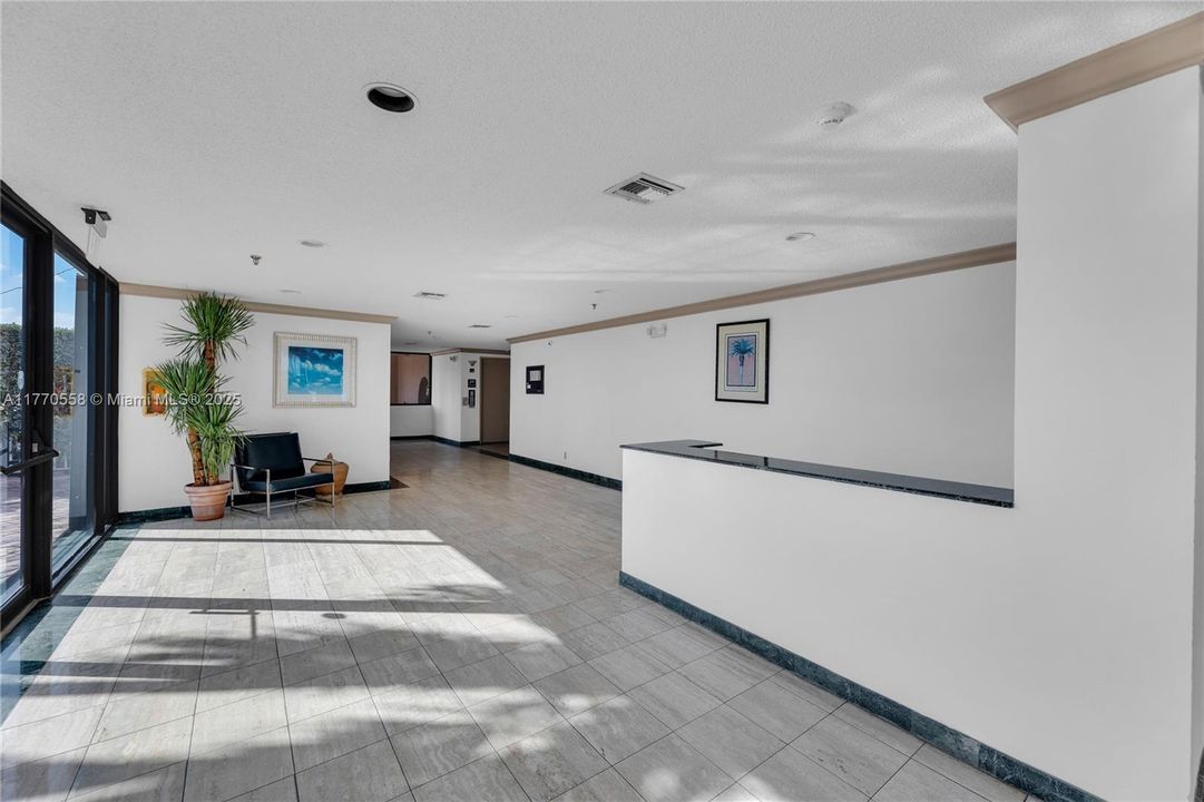 Secured entry. Has access to pool and garage from main floor