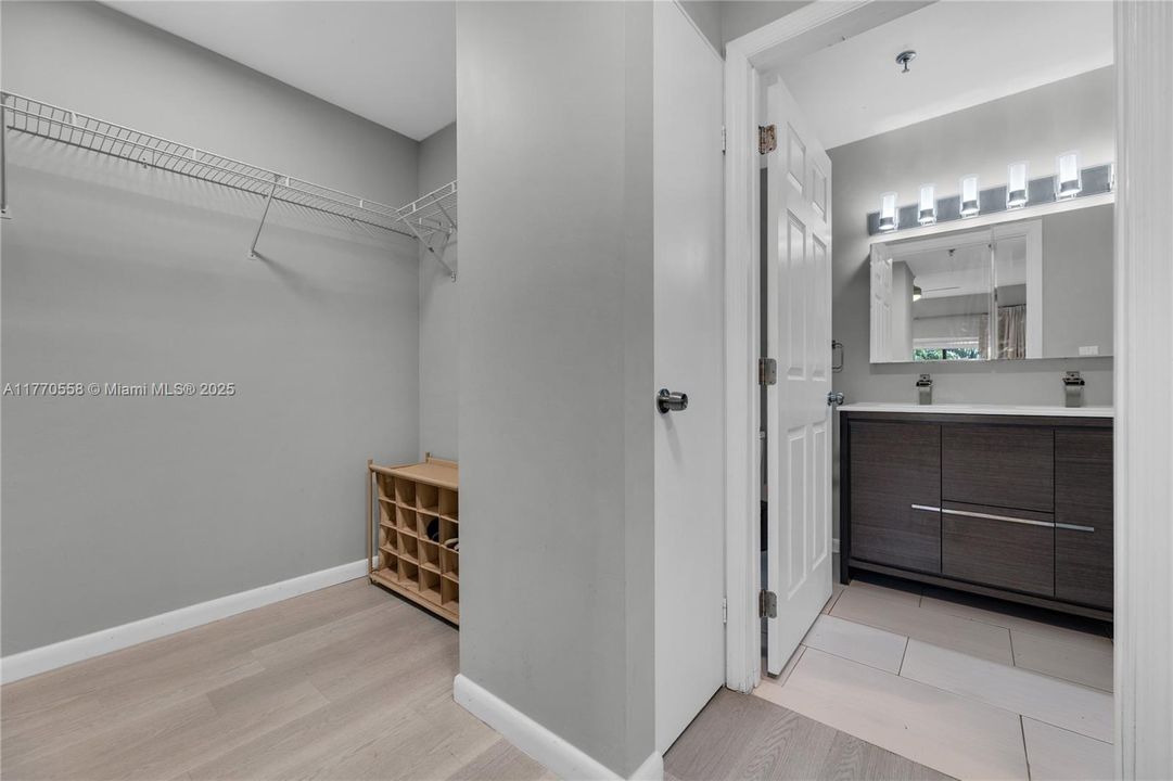 Open closet. Can be used as his/ her closet