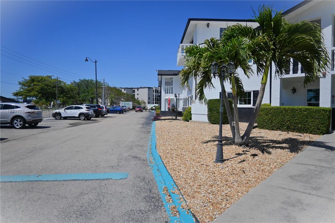 Unit is to the left of main building.