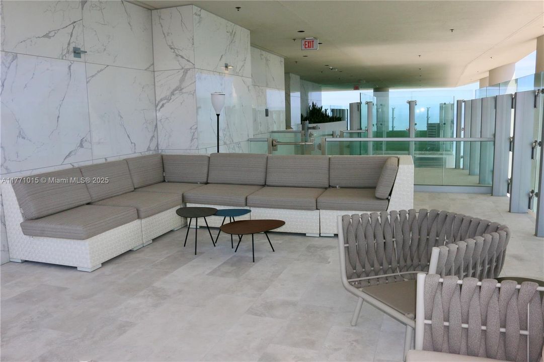 Common area with sofas in the club at Turnberry Ocean