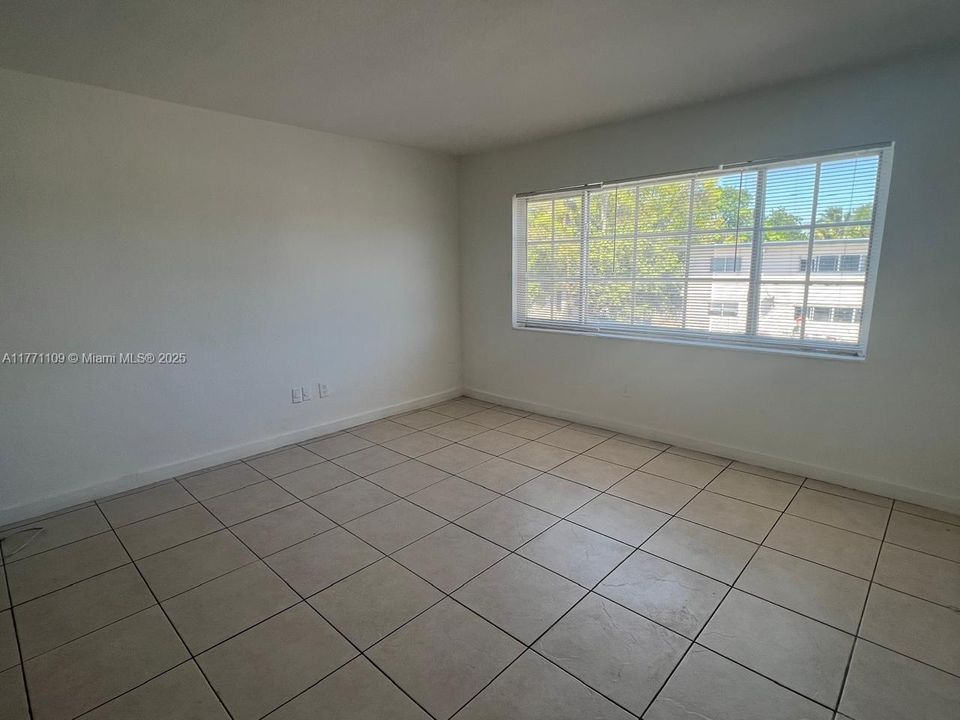 Big window overlooking green trees