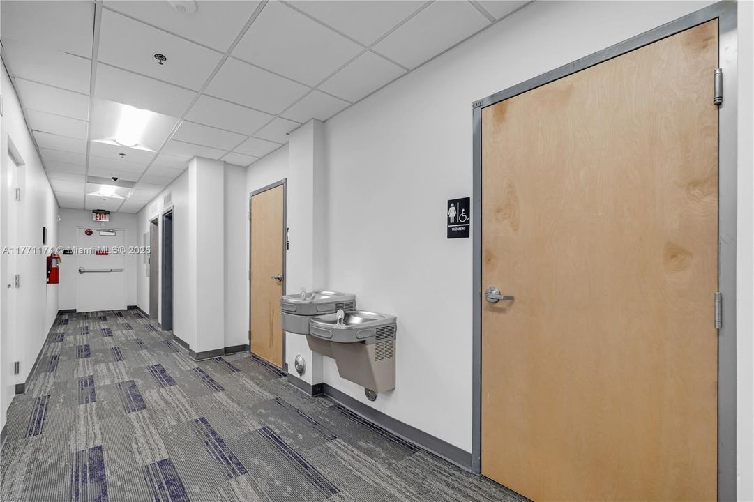 hall leading to bathrooms