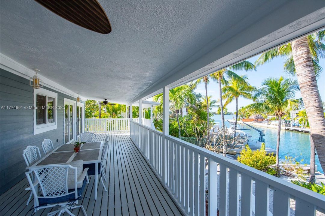 Large covered deck off living room with views