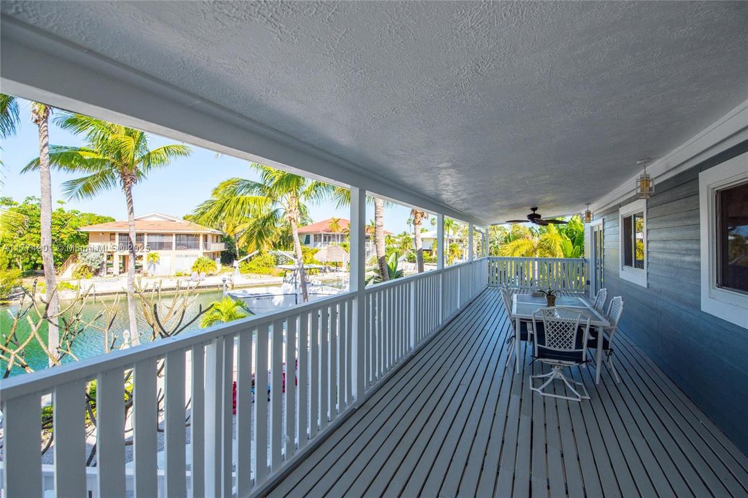 Large covered deck off living room with views