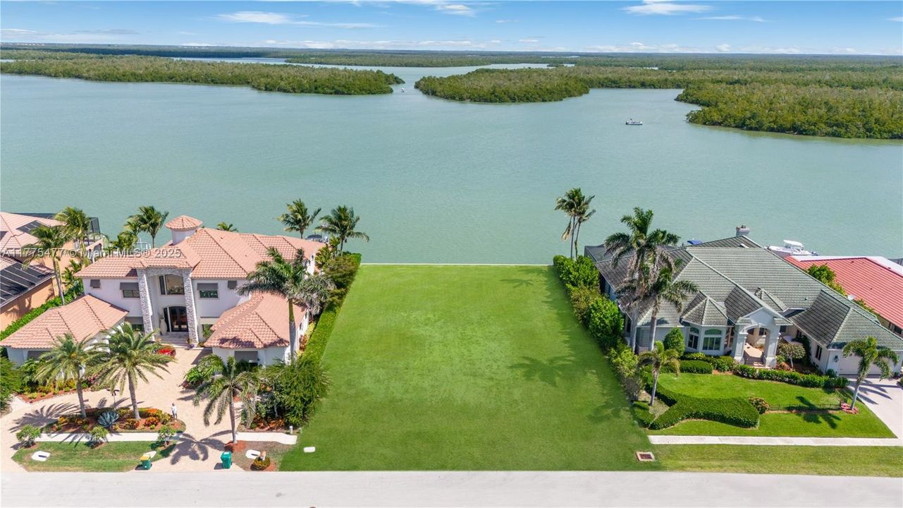 Enjoy the wonderful private, natural and peaceful views of the Marco River and Preserved area from your future home!