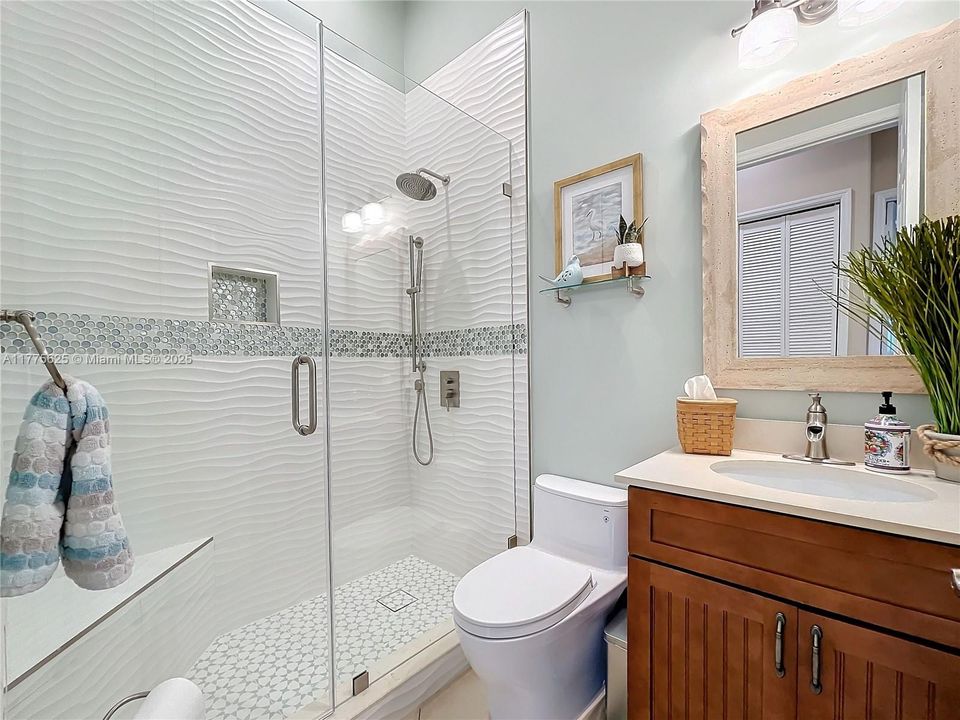 Bathroom near family room and office